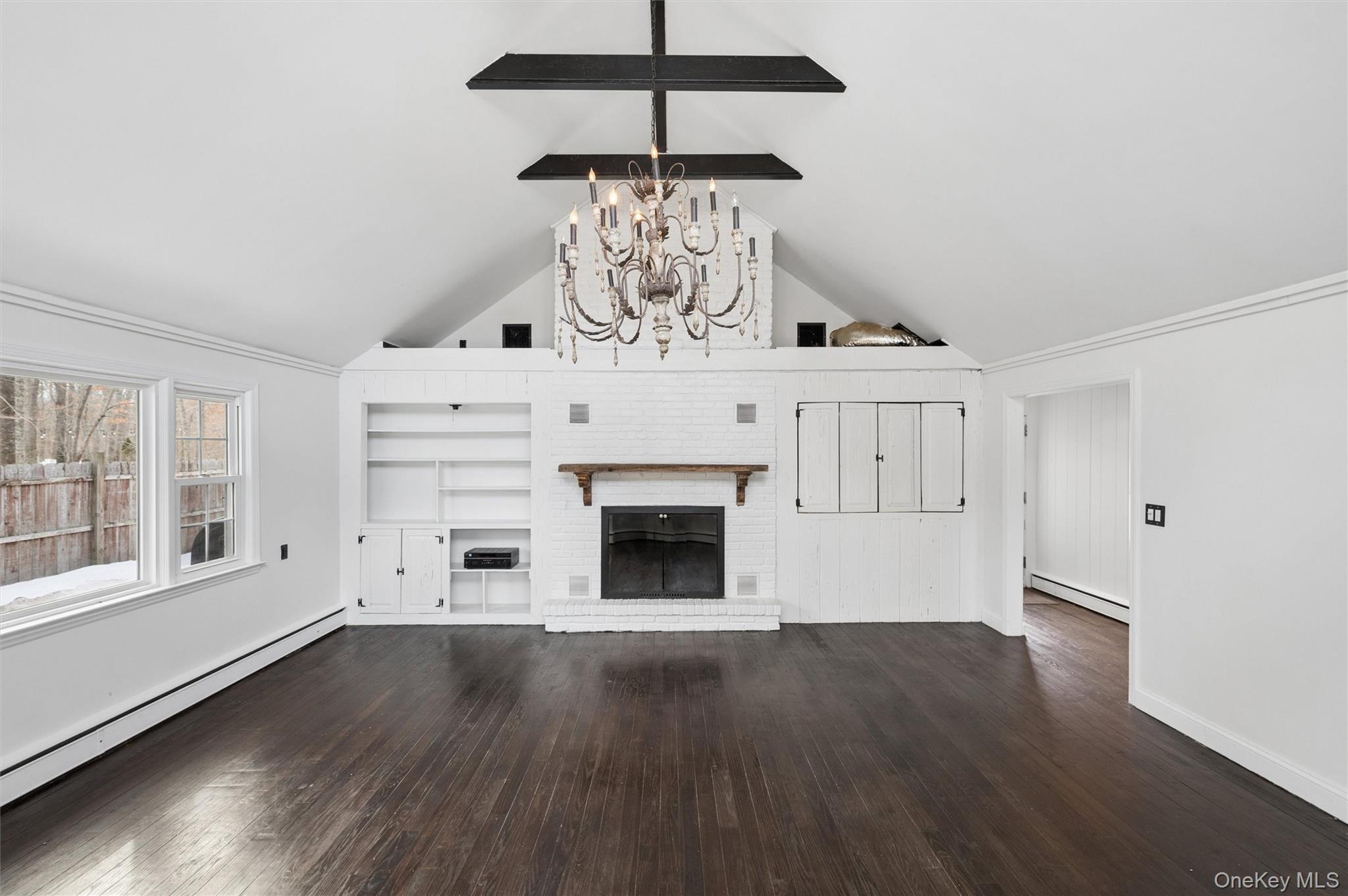 29 Squiretown Road, Unit D Hampton Bays, NY 11946 - Photo 7 of 26 Soaring Ceilings and Fireplace