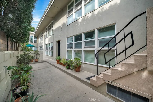 a view of a house with porch and wooden floor