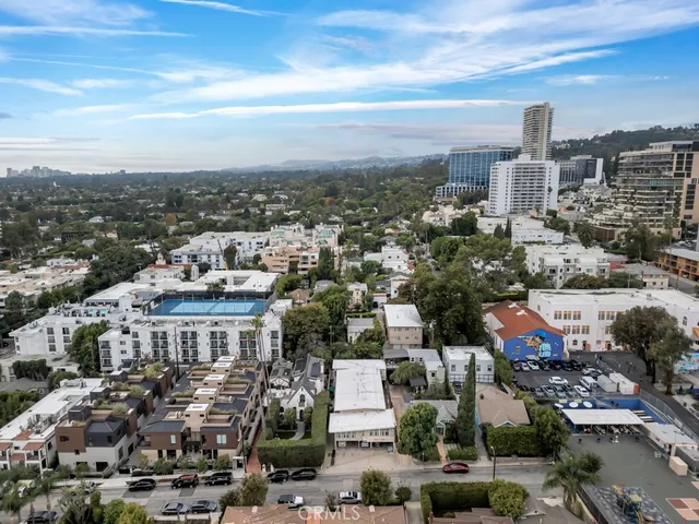 an aerial view of a city with lots of residential buildings