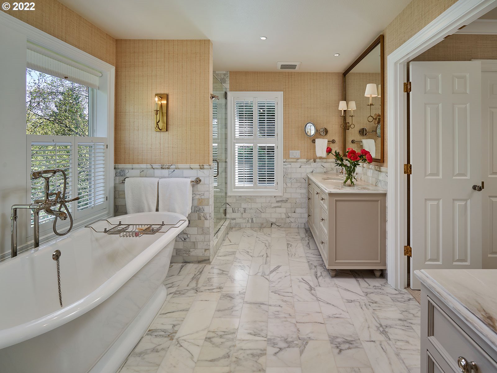 940 Southwest 67th Place Portland, OR 97225 - Photo 14 of 31 a bathroom with a granite countertop tub sink and mirror
