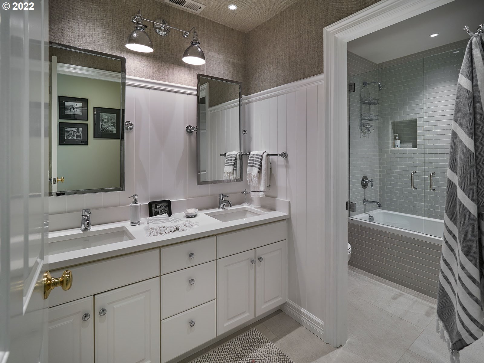 940 Southwest 67th Place Portland, OR 97225 - Photo 18 of 31 a bathroom with a double vanity sink mirror double and bathtub