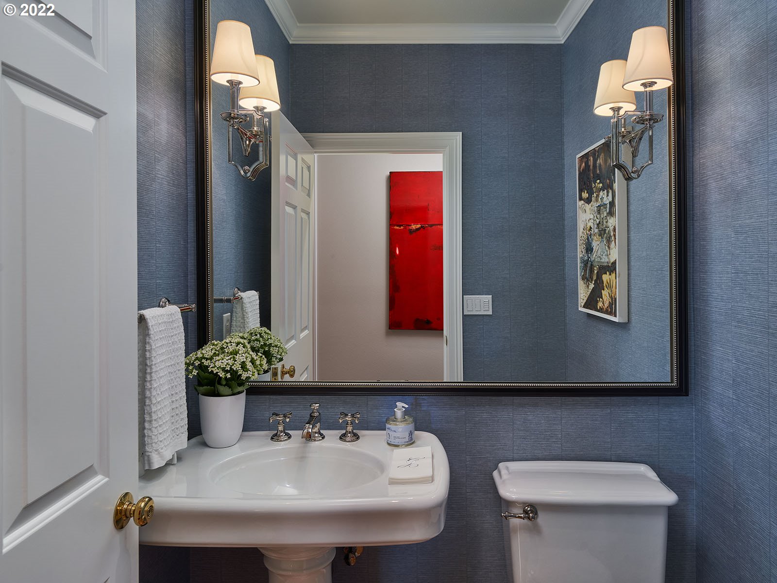 940 Southwest 67th Place Portland, OR 97225 - Photo 23 of 31 a bathroom with a sink and a mirror