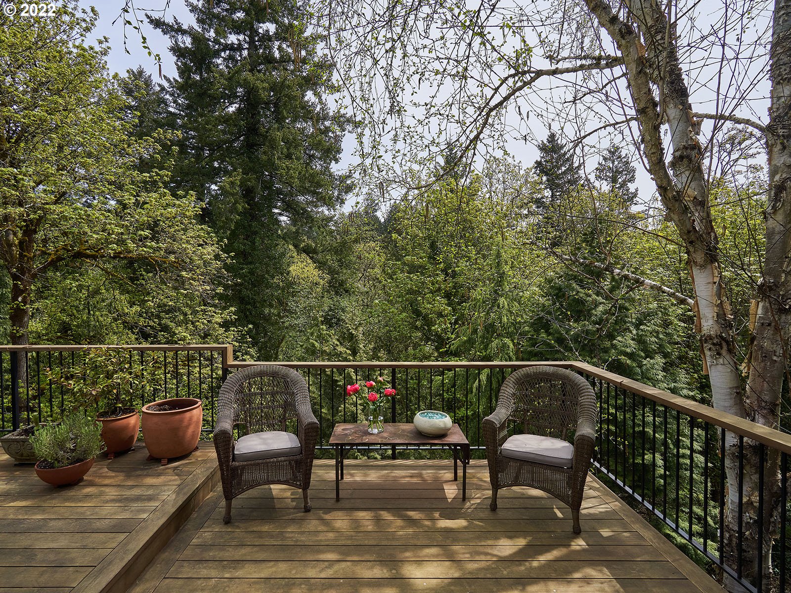 940 Southwest 67th Place Portland, OR 97225 - Photo 28 of 31 a view of a roof deck with couches and wooden floor