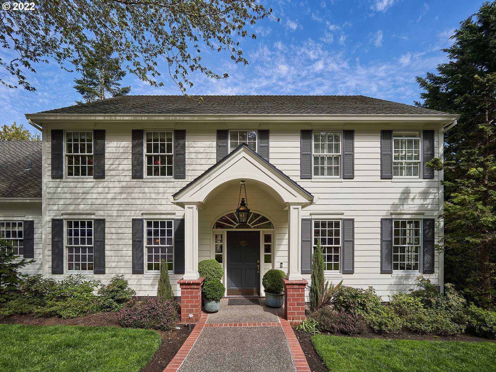 940 Southwest 67th Place Portland, OR 97225 - Photo 31 of 31 a front view of a house with garden