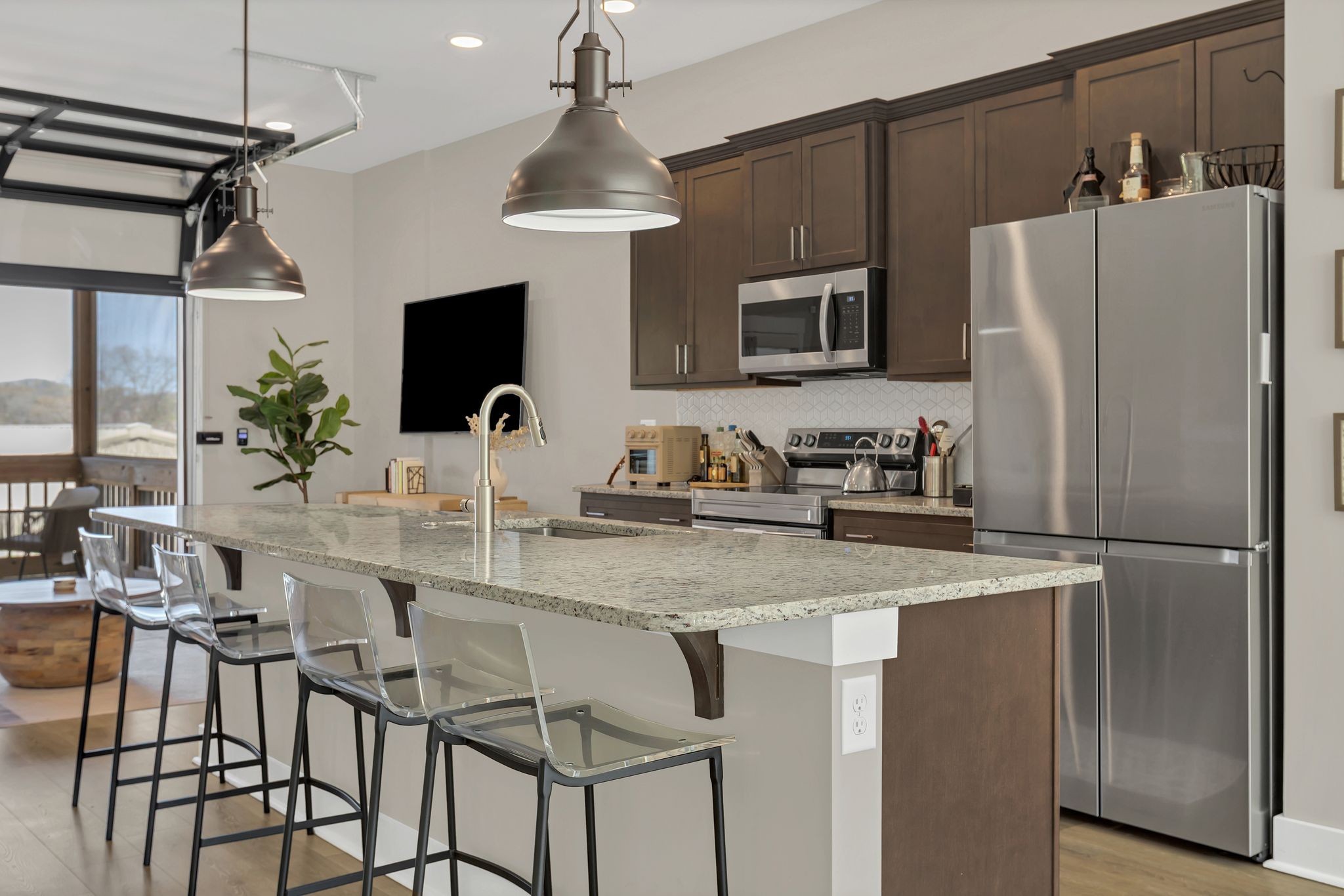 253 Stonecrest Drive Nashville, TN 37209 - Photo 11 of 36 a kitchen with stainless steel appliances granite countertop a refrigerator and a sink