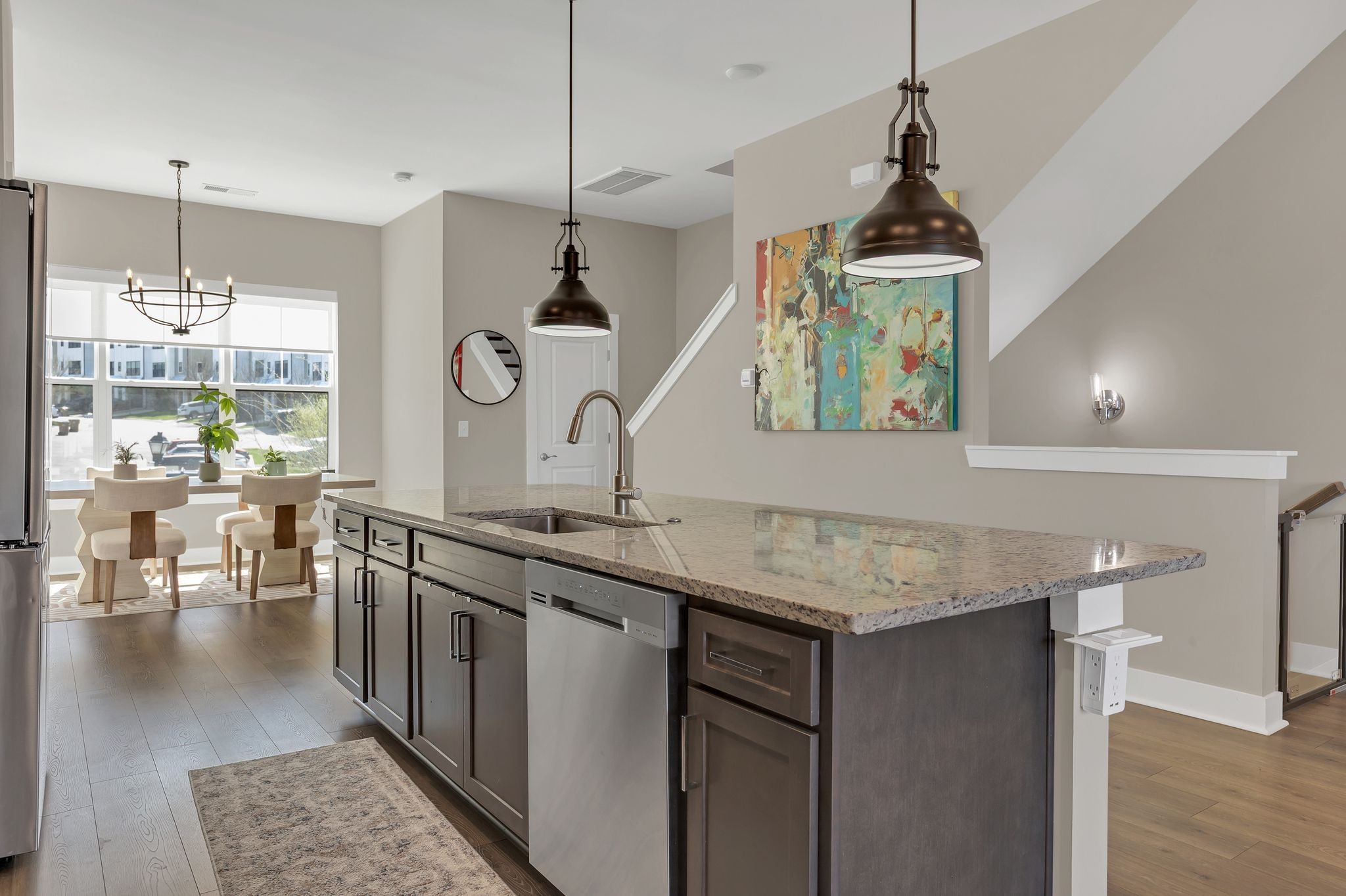 253 Stonecrest Drive Nashville, TN 37209 - Photo 13 of 36 a kitchen with stainless steel appliances granite countertop a stove a sink dishwasher and a wooden cabinets