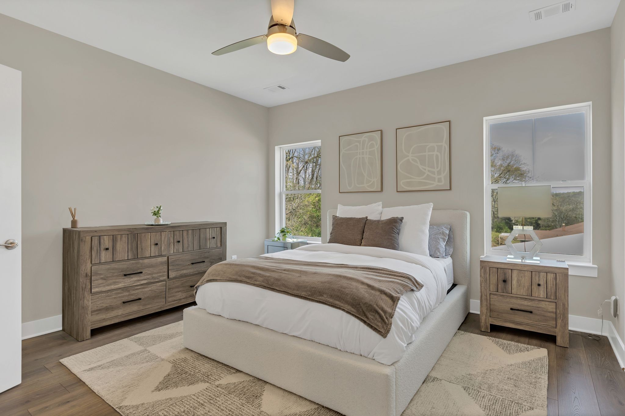 253 Stonecrest Drive Nashville, TN 37209 - Photo 26 of 36 a bedroom with a large bed and a window