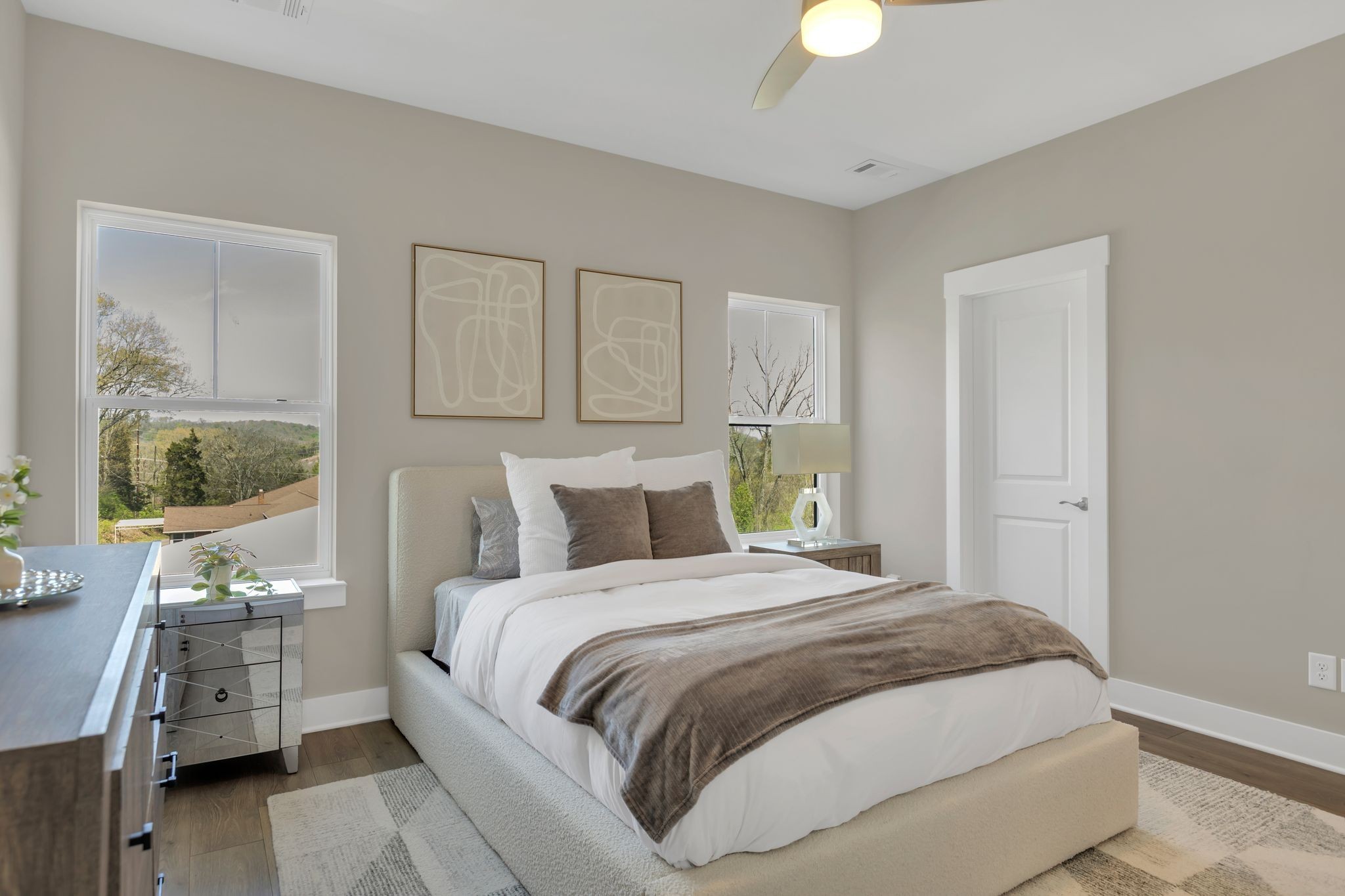 253 Stonecrest Drive Nashville, TN 37209 - Photo 27 of 36 a bedroom with a bed and ceiling fan