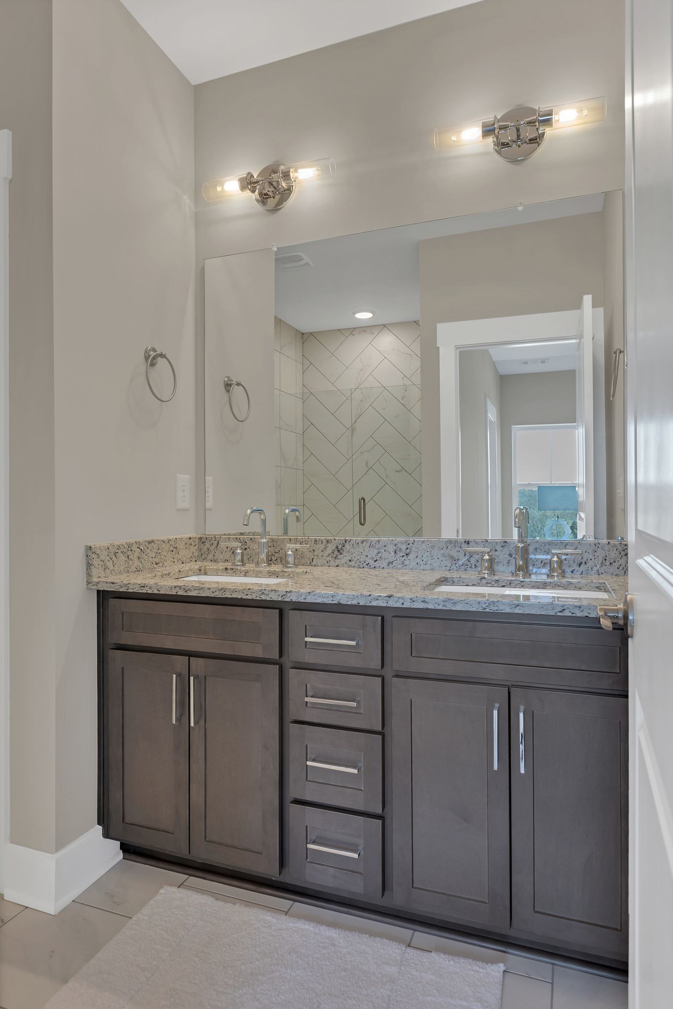 253 Stonecrest Drive Nashville, TN 37209 - Photo 28 of 36 a bathroom with a granite countertop sink and a mirror
