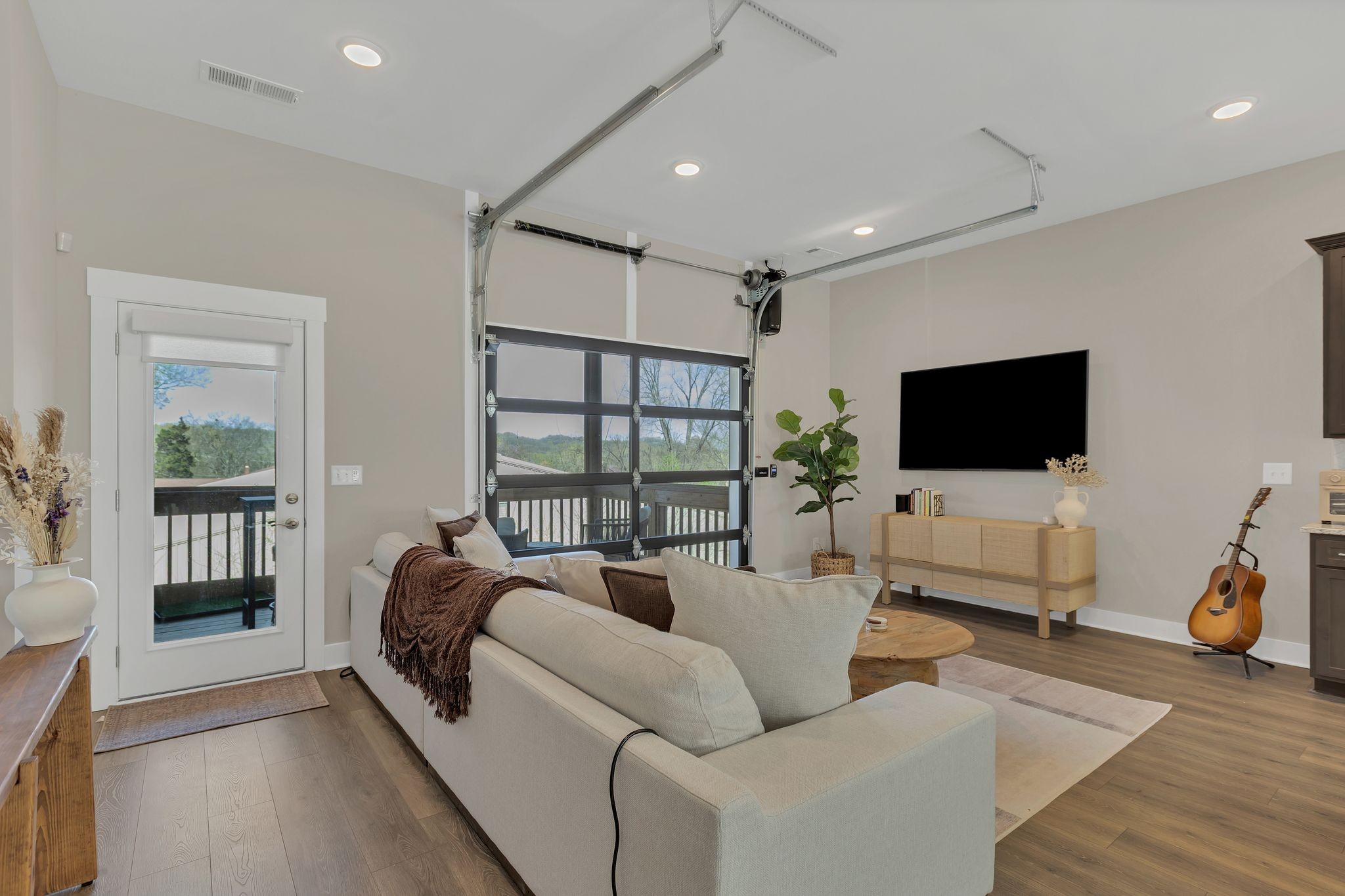 253 Stonecrest Drive Nashville, TN 37209 - Photo 7 of 36 a living room with furniture and a flat screen tv