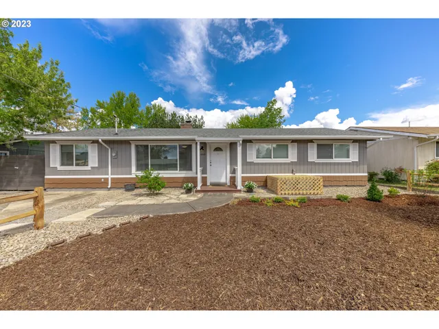 a view of a house with a swimming pool