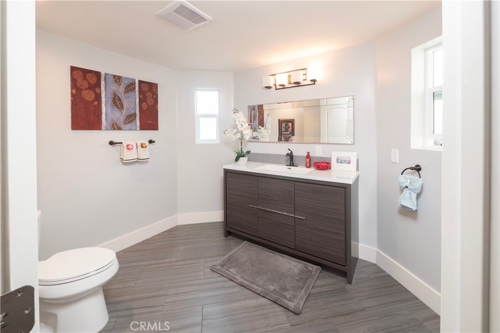 1310 Coronet Drive Riverside, CA 92506 - Photo 17 of 59 Front entry powder room
