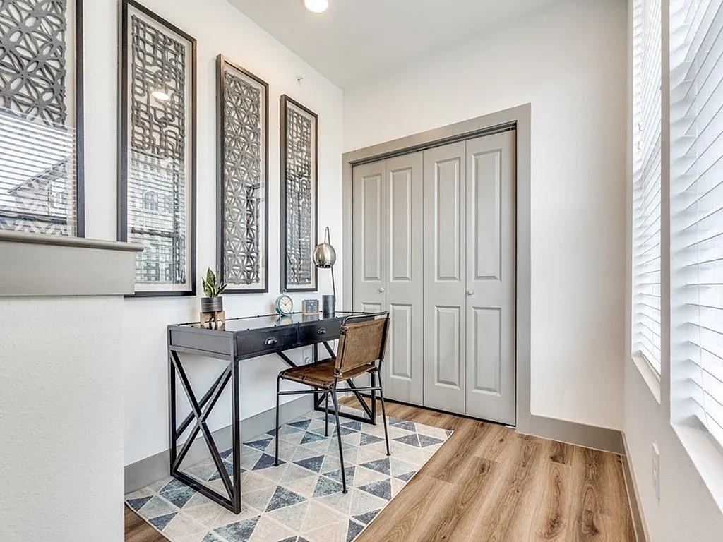 4020 McEwen Road, Unit 9123 Farmers Branch, TX 75244 - Photo 5 of 20 a view of a room that has a table and chair in it