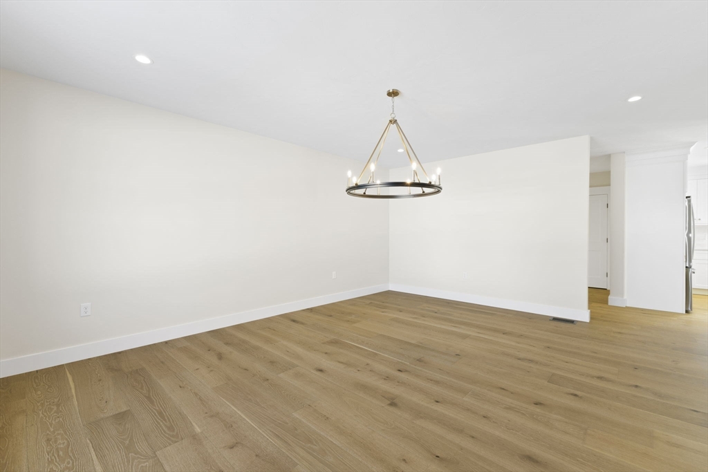 1 Haystack Lane Berkley, MA 02779 - Photo 17 of 33 a view of empty room with wooden floor