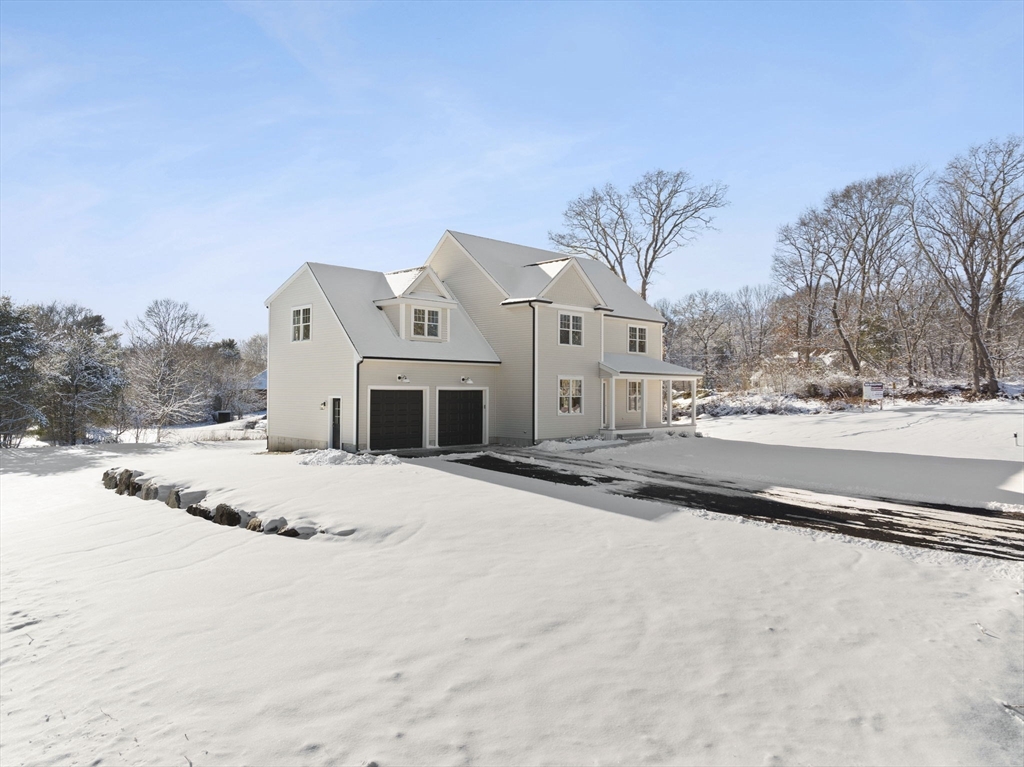 1 Haystack Lane Berkley, MA 02779 - Photo 2 of 33 a view of a house with a yard covered in snow