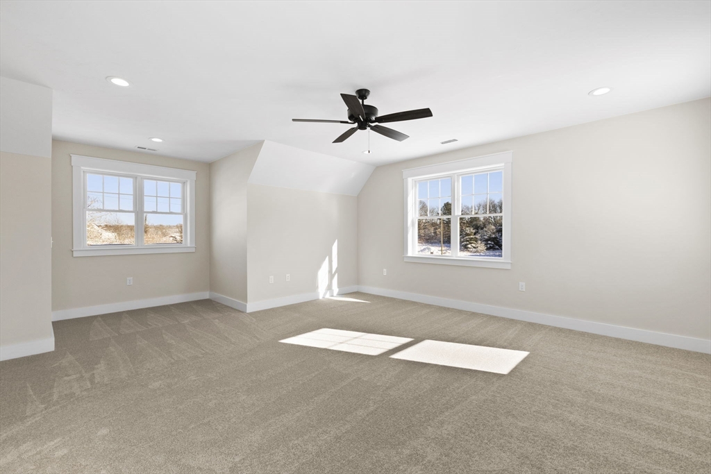 1 Haystack Lane Berkley, MA 02779 - Photo 21 of 33 an empty room with windows and fan