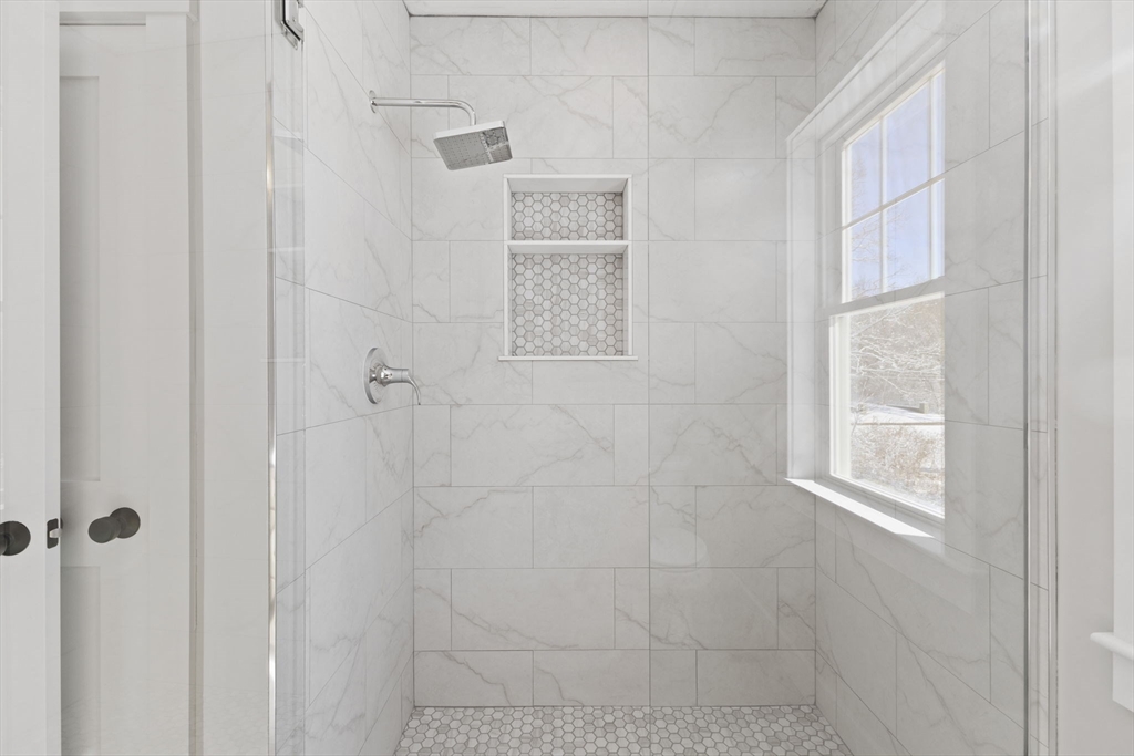 1 Haystack Lane Berkley, MA 02779 - Photo 24 of 33 a bathroom with a window and shower