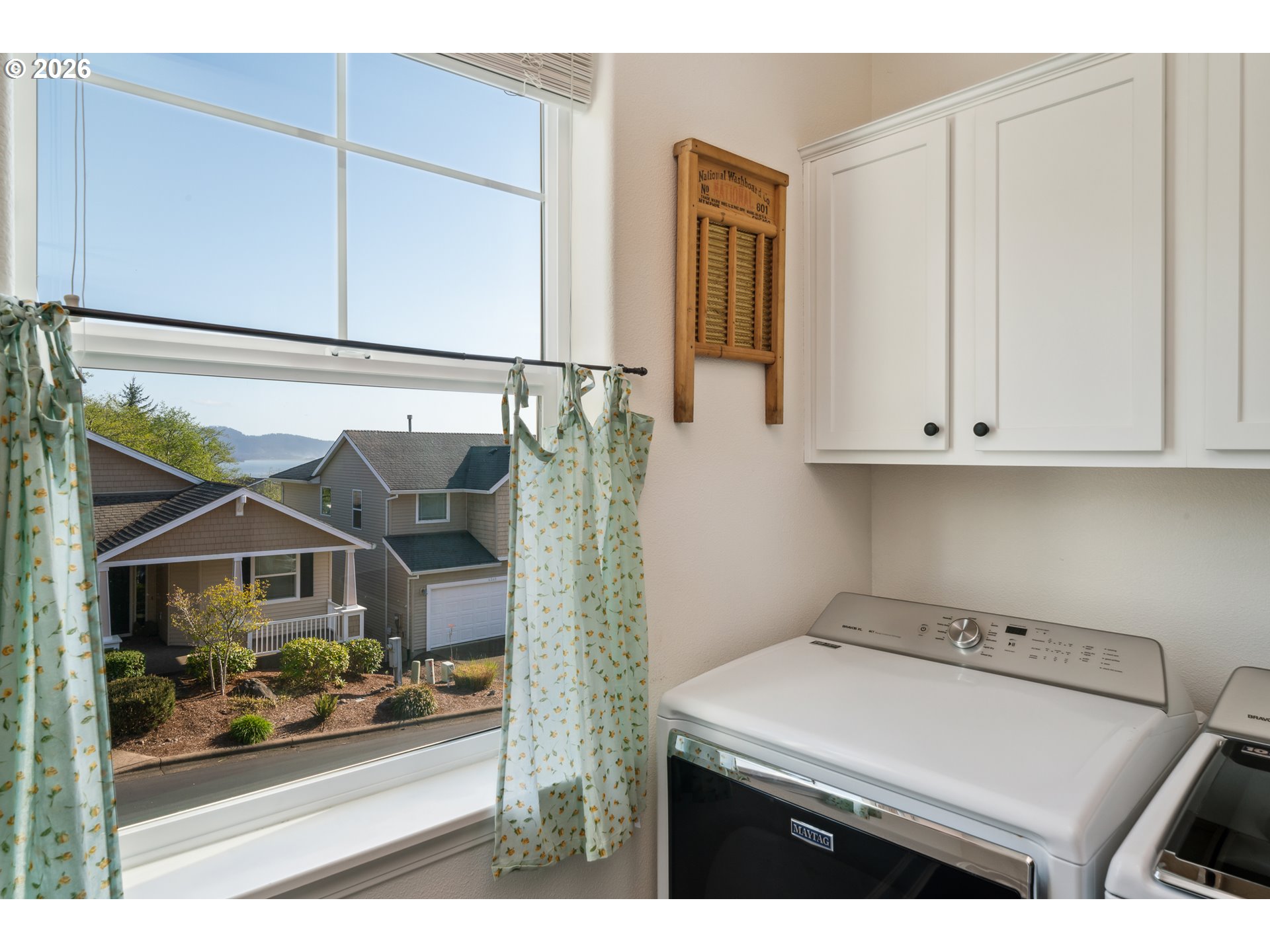 4300 Sequoia Loop Netarts, OR 97141 - Photo 12 of 39 a utility room with dryer and washer