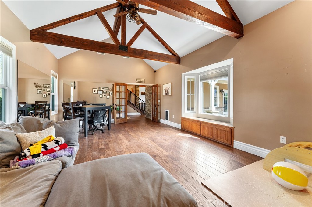 31800 3rd Street Acton, CA 93510 - Photo 22 of 47 a living room filled with furniture and a wooden floor