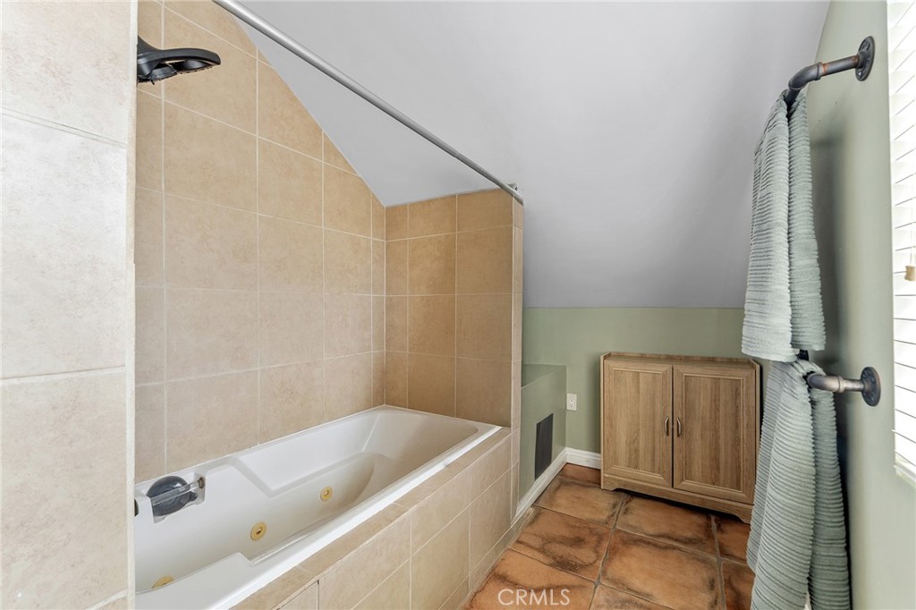 31800 3rd Street Acton, CA 93510 - Photo 30 of 47 a bathroom with a tub a sink and wooden floor