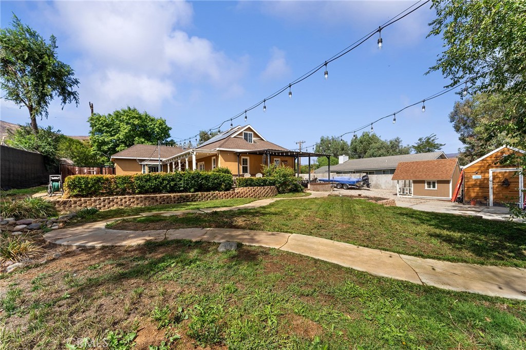 31800 3rd Street Acton, CA 93510 - Photo 37 of 47 a view of house with garden space and car parked