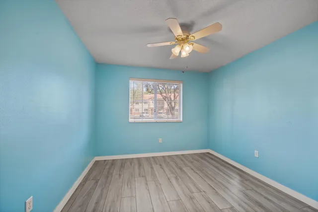 a view of a swimming pool and a yard