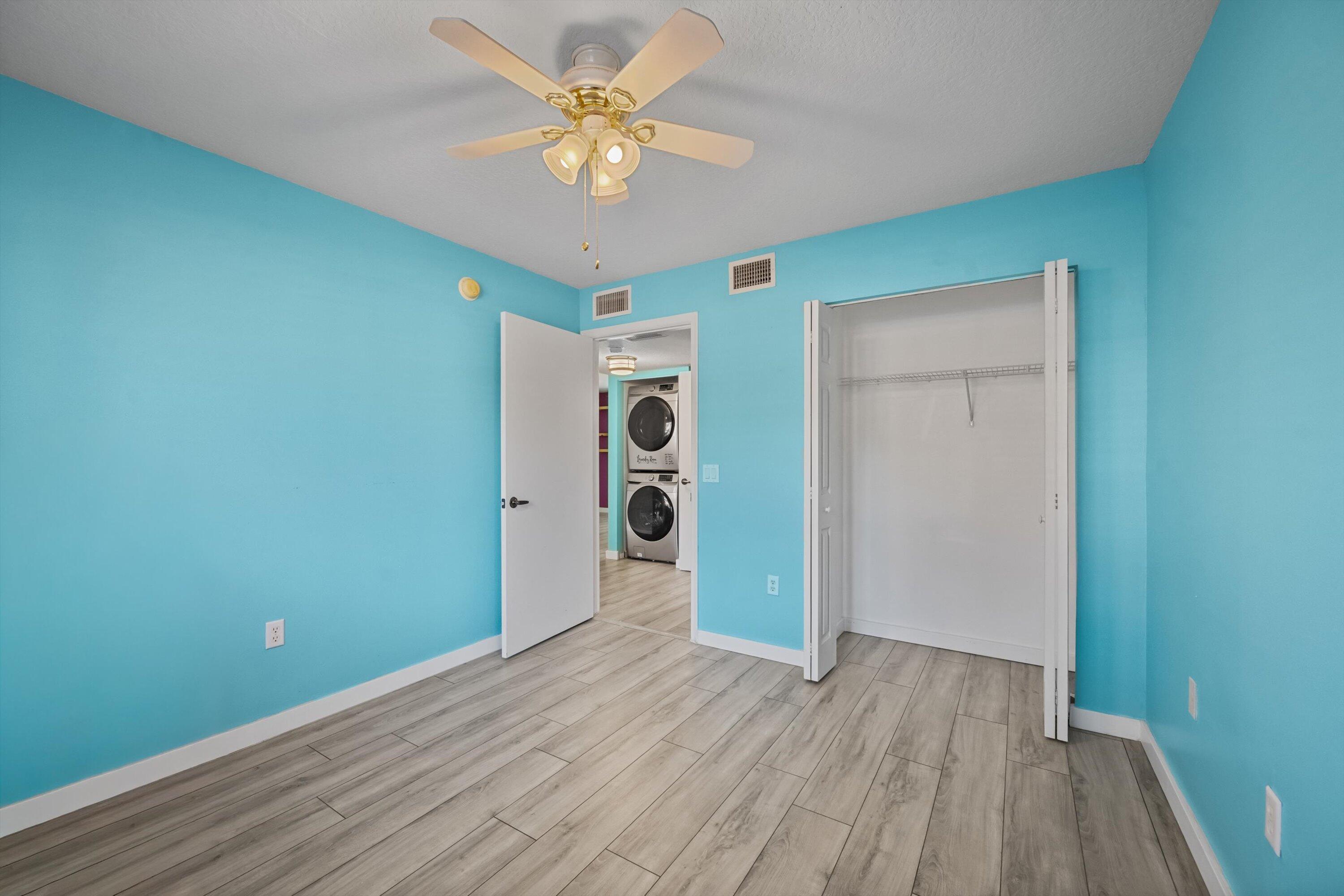 3486 Briar Bay Boulevard, Unit 101 West Palm Beach, FL 33411 - Photo 25 of 46 Bedroom 3