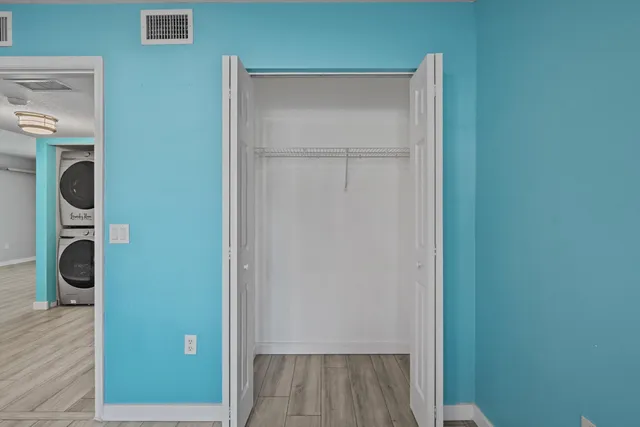 an aerial view of residential houses with outdoor space and swimming pool