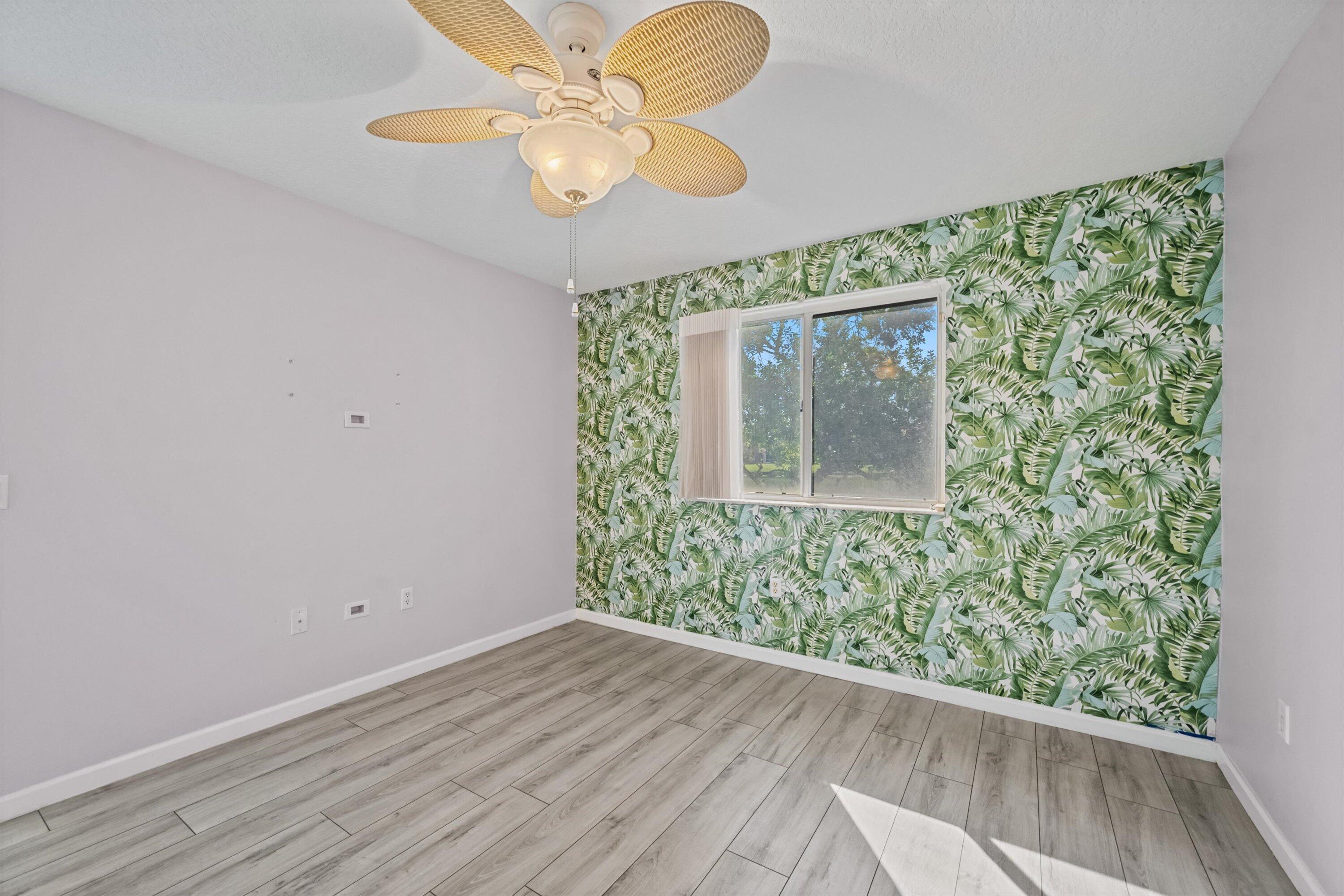 3486 Briar Bay Boulevard, Unit 101 West Palm Beach, FL 33411 - Photo 27 of 46 Master Bedroom