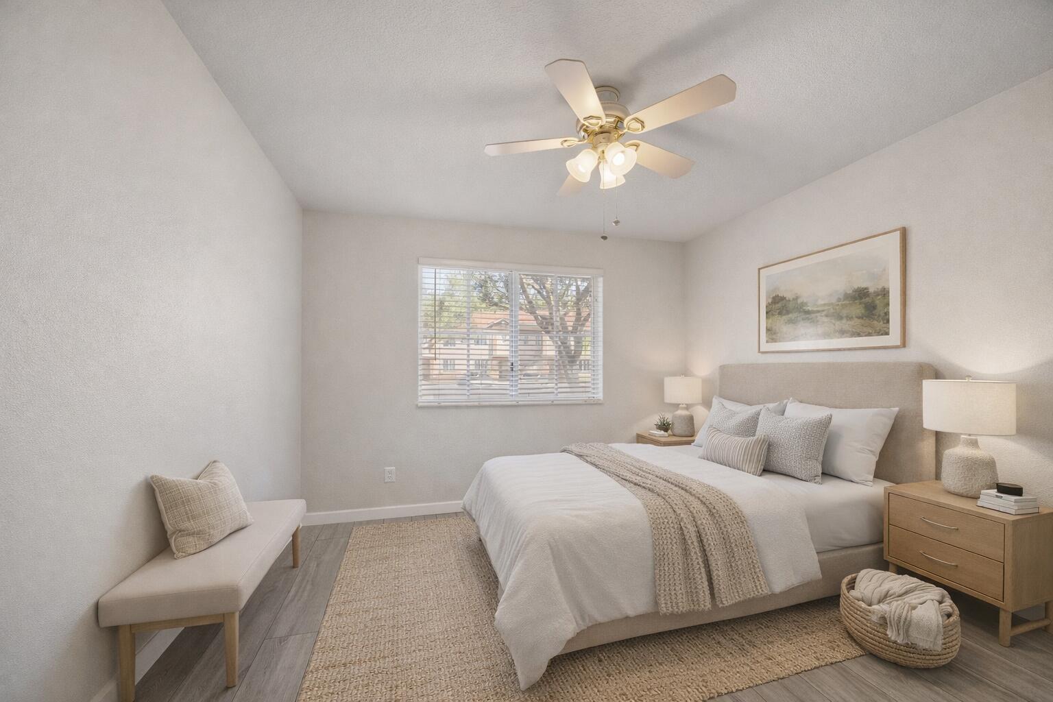 3486 Briar Bay Boulevard, Unit 101 West Palm Beach, FL 33411 - Photo 3 of 46 a bedroom with a bed and a chandelier