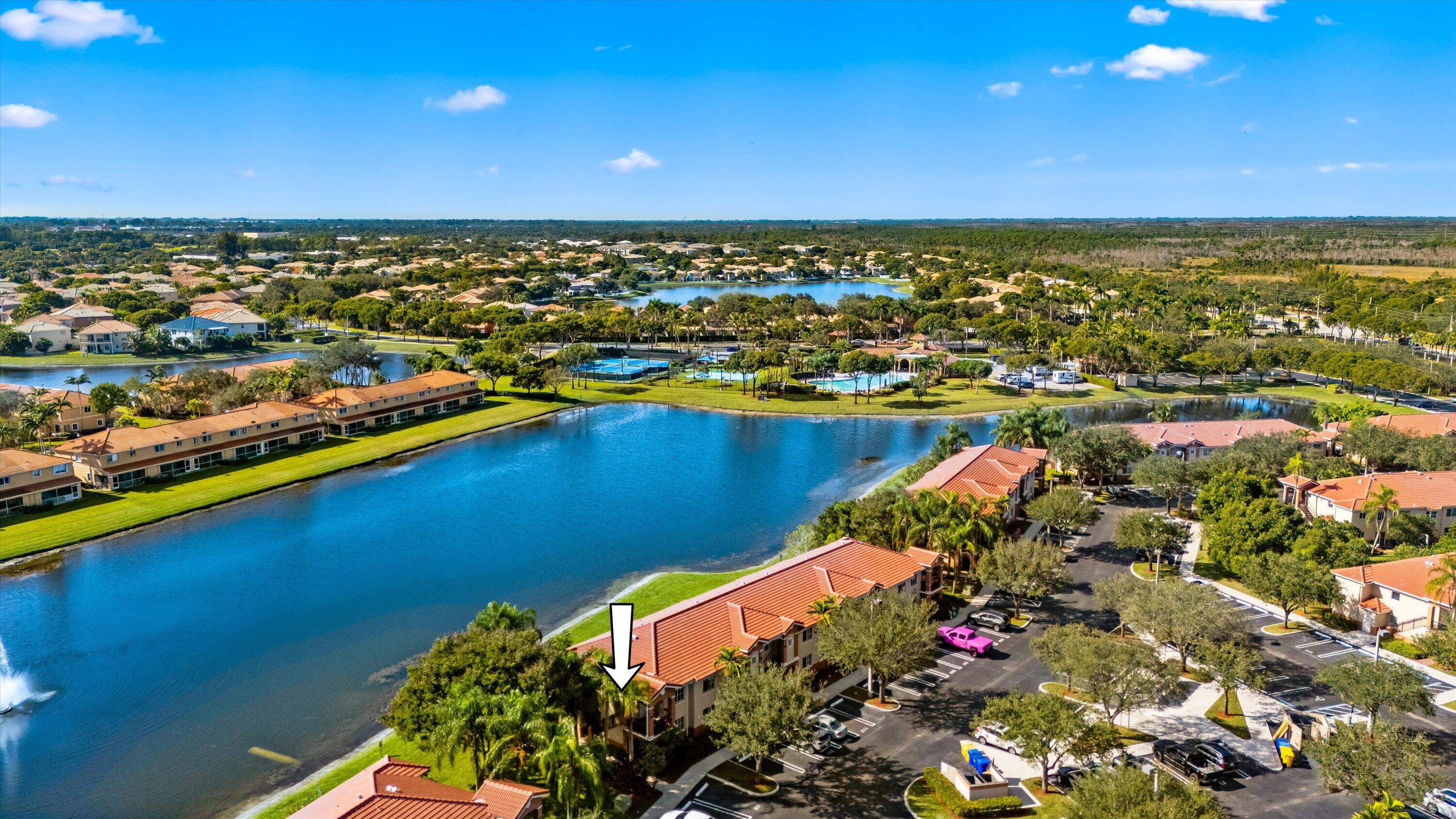 3486 Briar Bay Boulevard, Unit 101 West Palm Beach, FL 33411 - Photo 41 of 46 41-DJI_20251212110739_0414_D-Edit