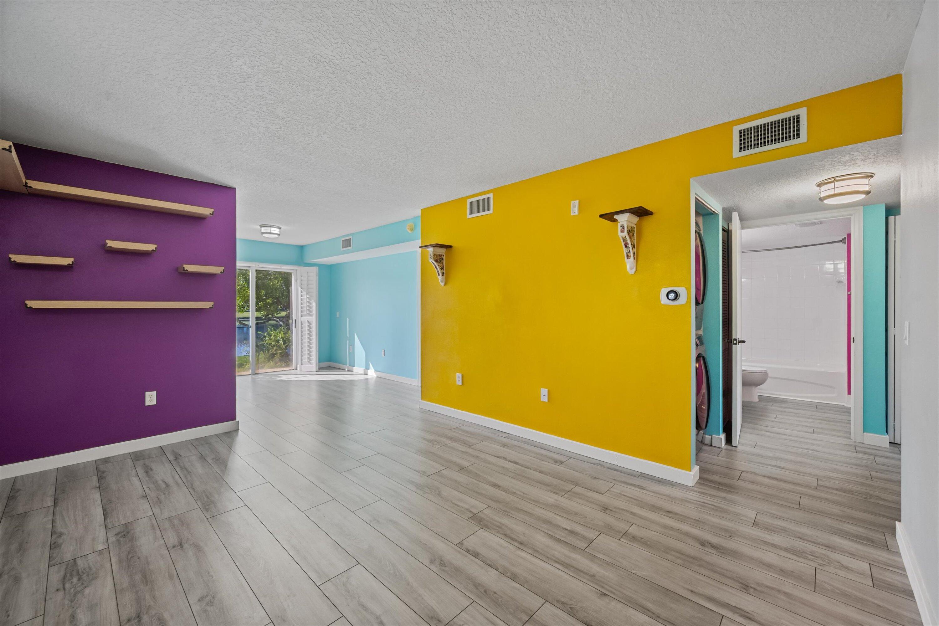 3486 Briar Bay Boulevard, Unit 101 West Palm Beach, FL 33411 - Photo 7 of 46 Living Room