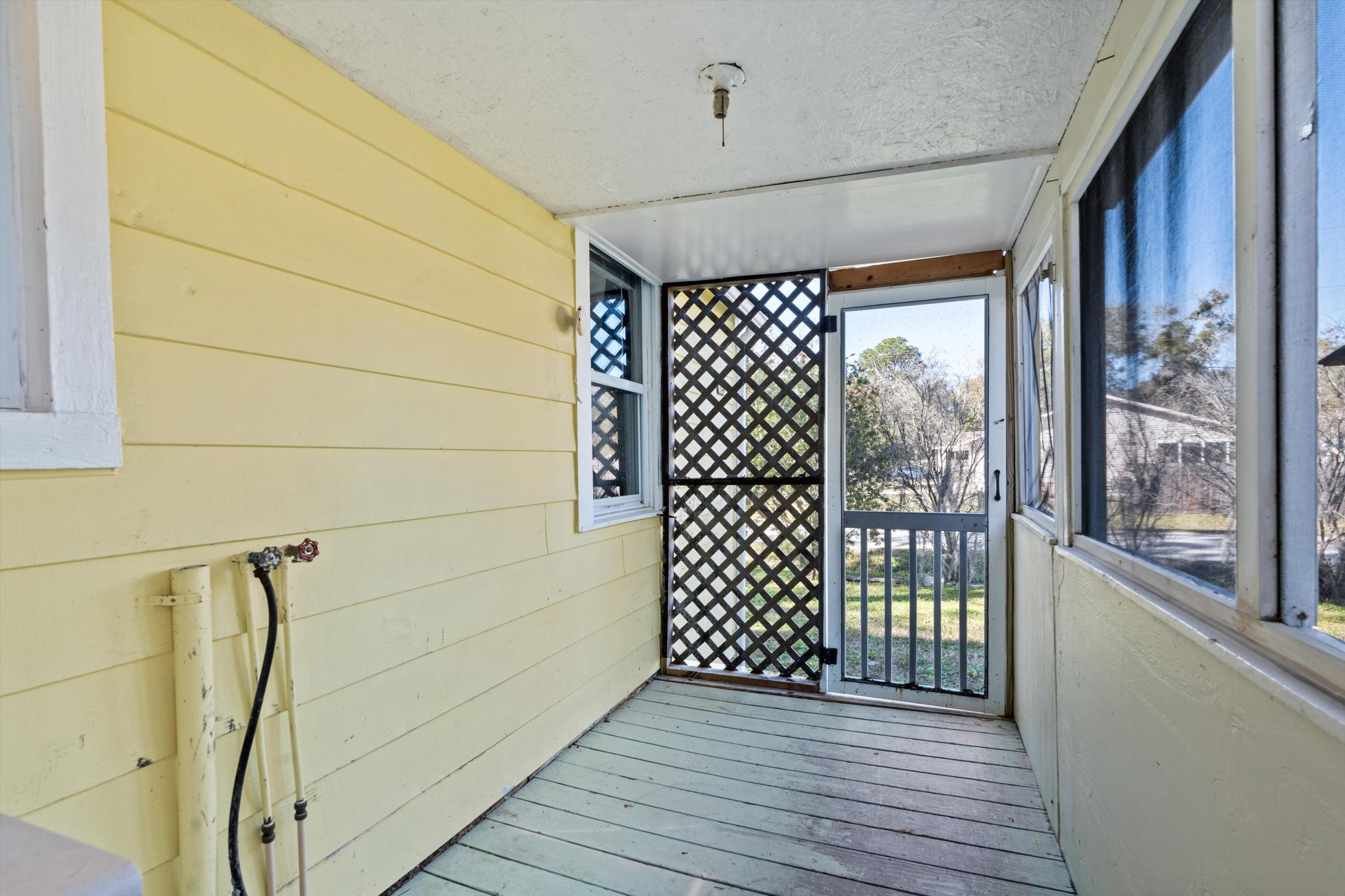 4588 First Avenue St. Augustine, FL 32095 - Photo 11 of 25 a view of a room with wooden walls