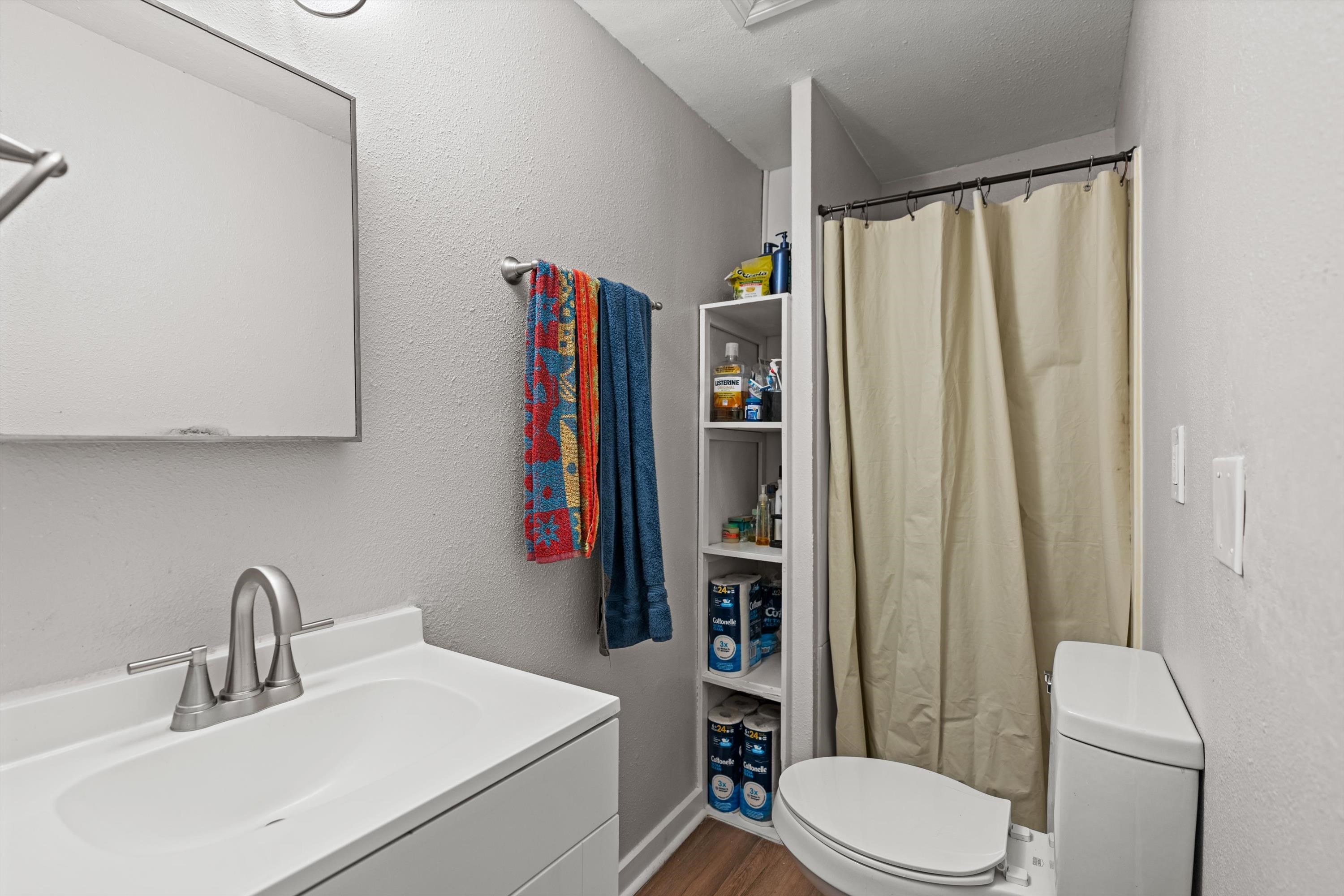 4588 First Avenue St. Augustine, FL 32095 - Photo 17 of 25 a bathroom with a sink toilet and shower