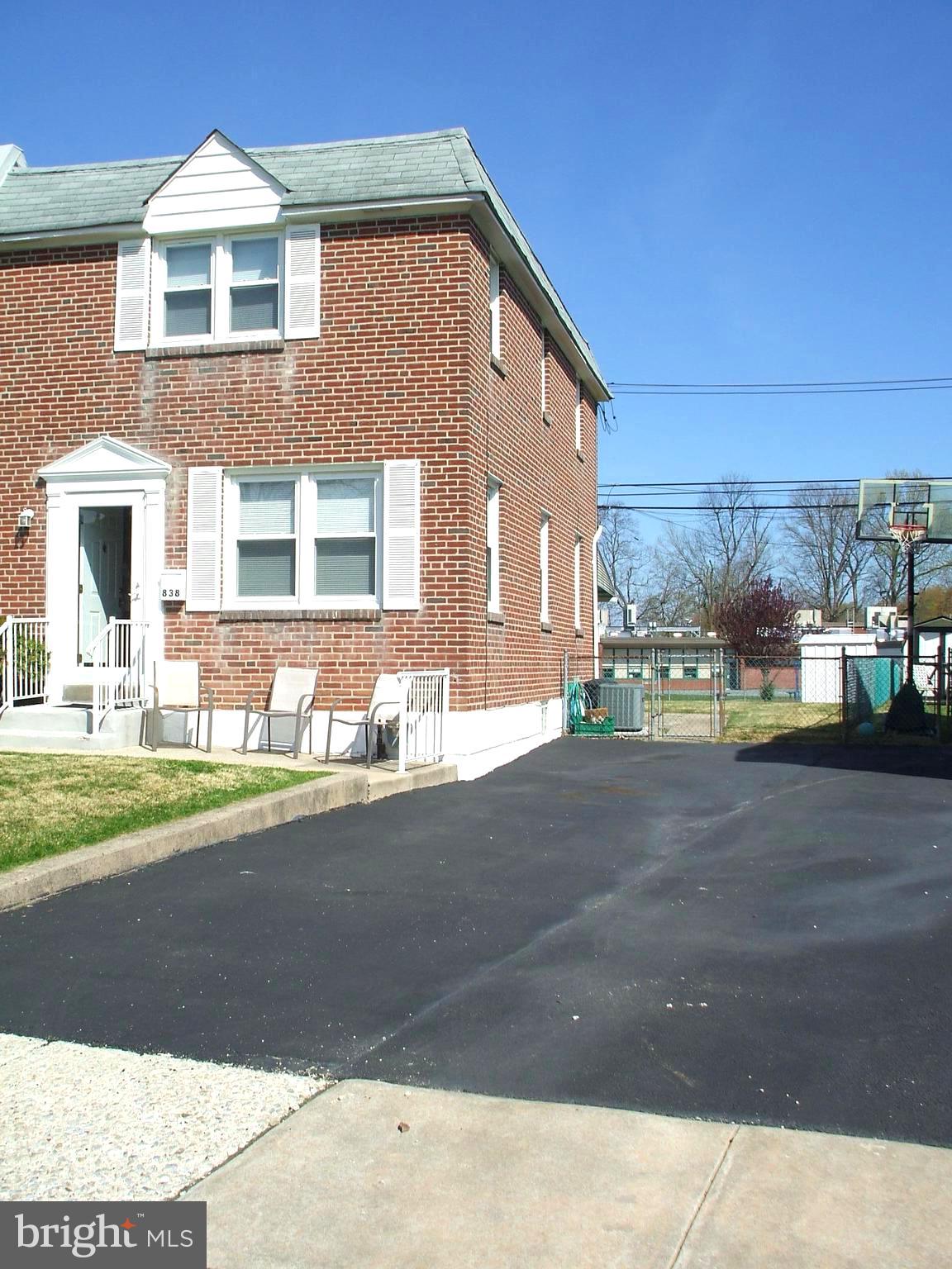 Cul-De-Sac Street & Stately Brick Exterior