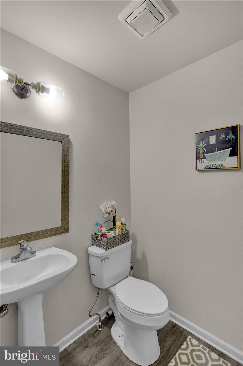 383 Oneida Drive Reading, PA 19608 - Photo 11 of 27 a bathroom with a sink toilet and a mirror