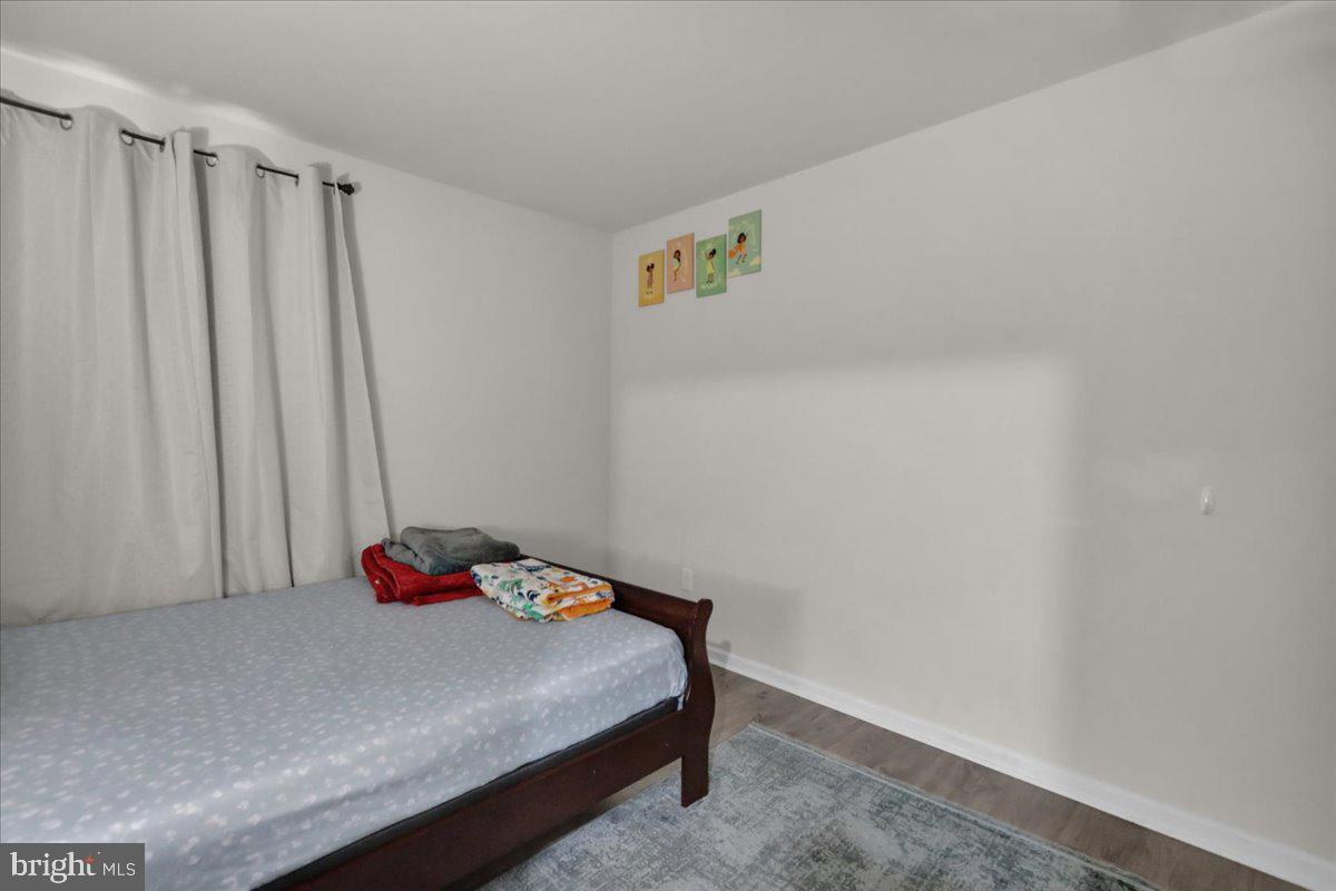 383 Oneida Drive Reading, PA 19608 - Photo 12 of 27 a bedroom with a bed and a window