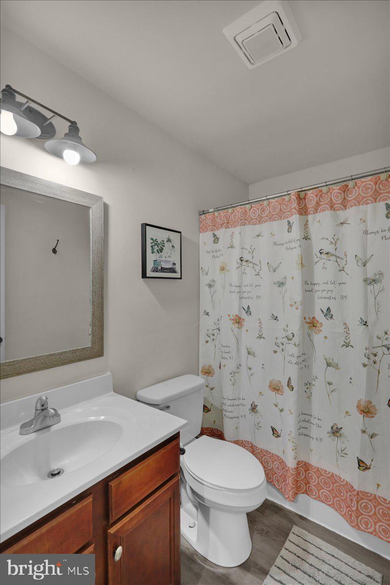 383 Oneida Drive Reading, PA 19608 - Photo 17 of 27 a bathroom with a sink toilet and shower