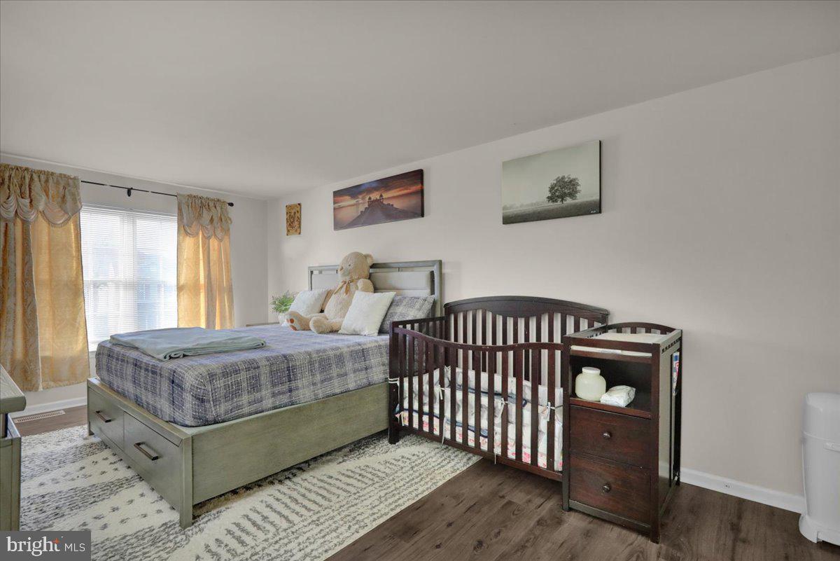 383 Oneida Drive Reading, PA 19608 - Photo 18 of 27 a bedroom with a bed and window