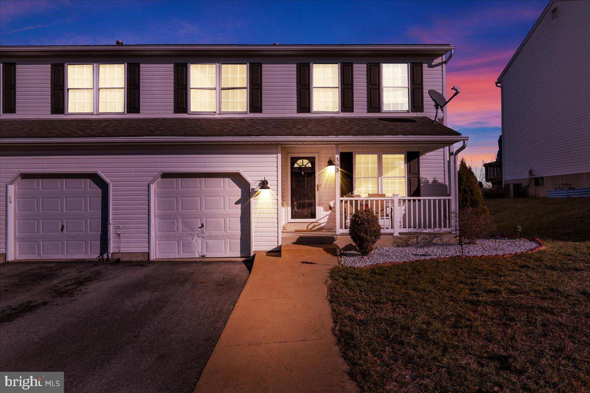 383 Oneida Drive Reading, PA 19608 - Photo 27 of 27 a living room with furniture and a fireplace