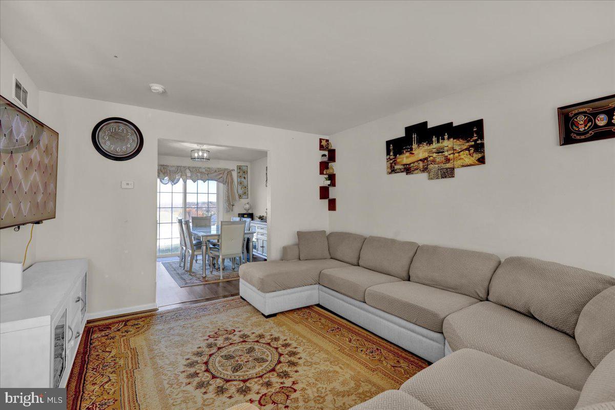 383 Oneida Drive Reading, PA 19608 - Photo 3 of 27 a living room with furniture and a rug