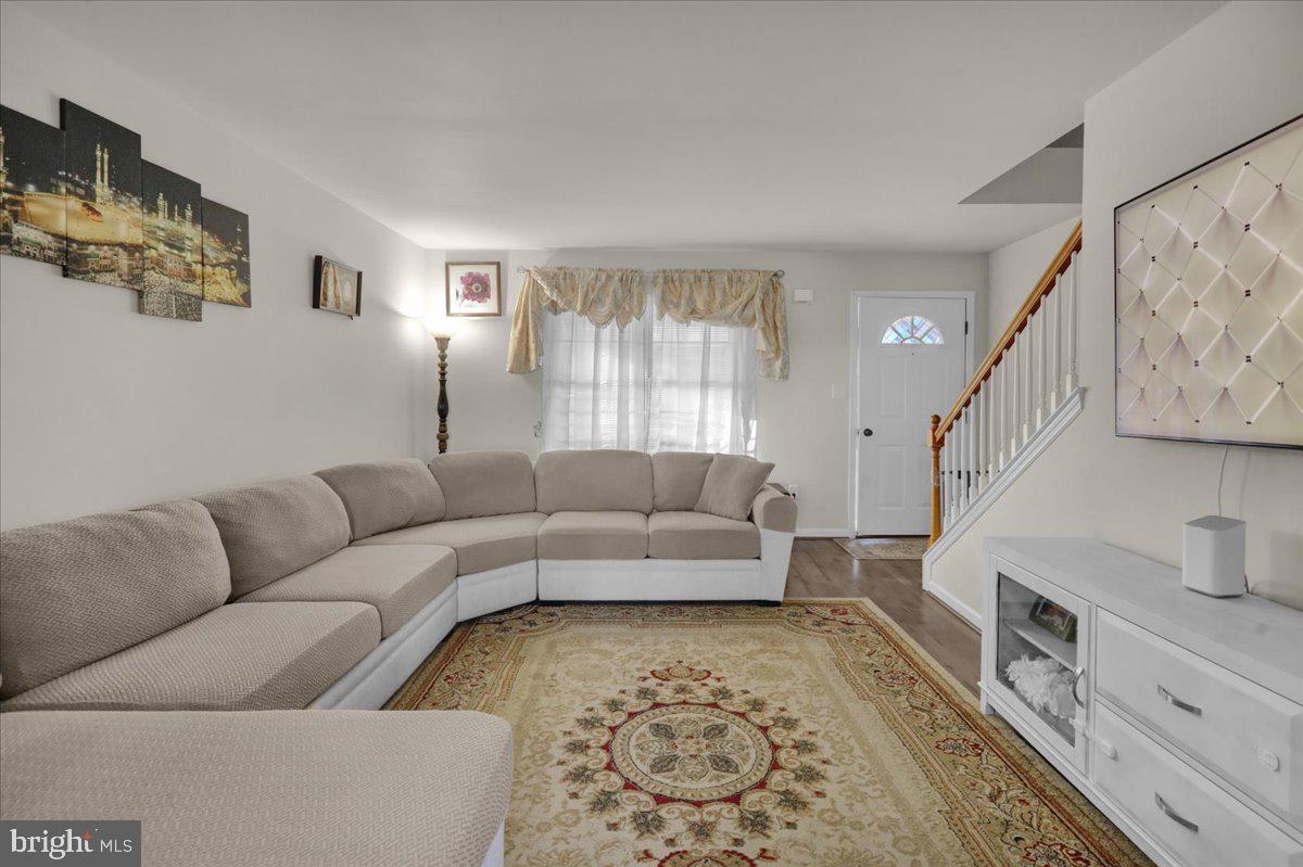 383 Oneida Drive Reading, PA 19608 - Photo 4 of 27 a living room with furniture and a fireplace