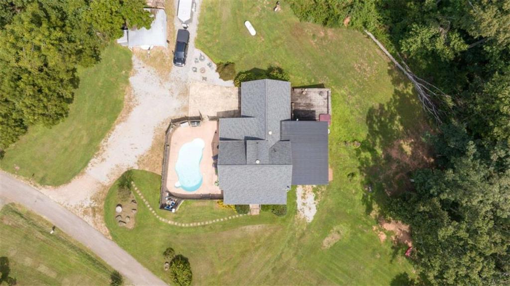 131 Caudell Drive Lula, GA 30554 - Photo 2 of 45 an aerial view of a house with swimming pool