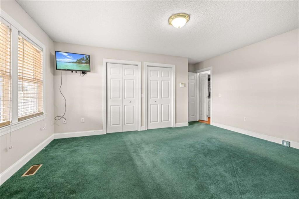 131 Caudell Drive Lula, GA 30554 - Photo 23 of 45 a view of a room with window and hardwood floor