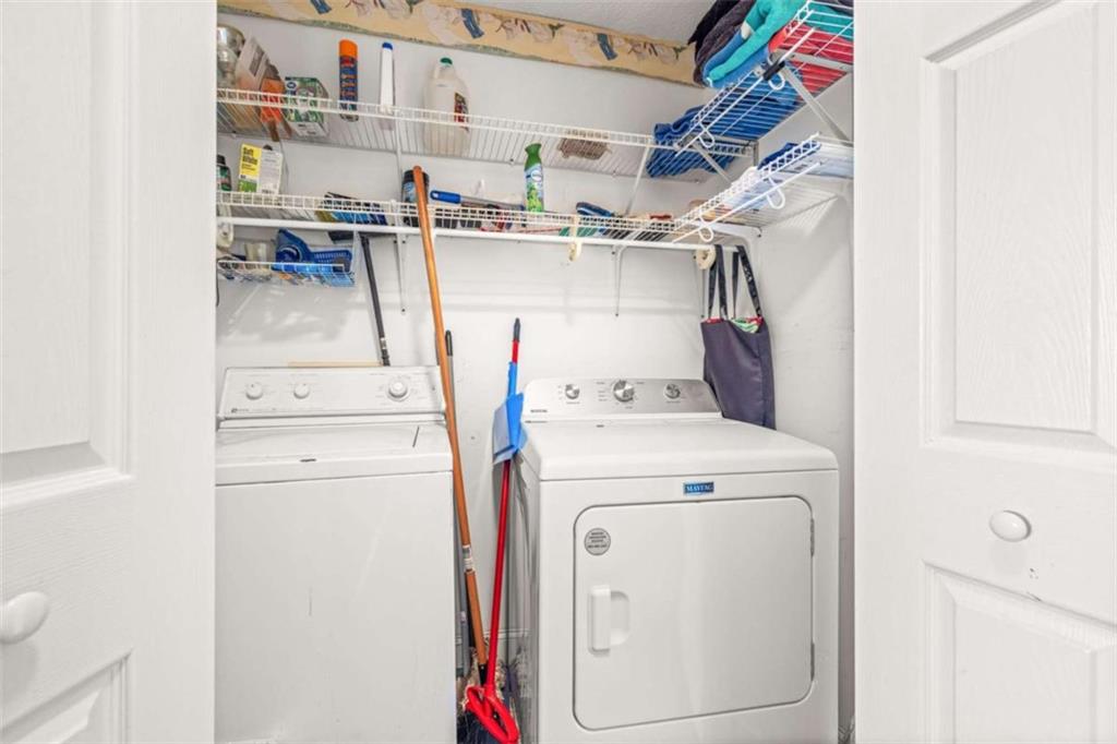 131 Caudell Drive Lula, GA 30554 - Photo 28 of 45 a view of storage and utility room with washer and dryer