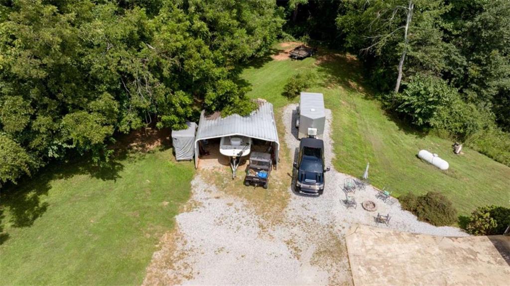 131 Caudell Drive Lula, GA 30554 - Photo 43 of 45 an aerial view of a house with garden space and sitting area