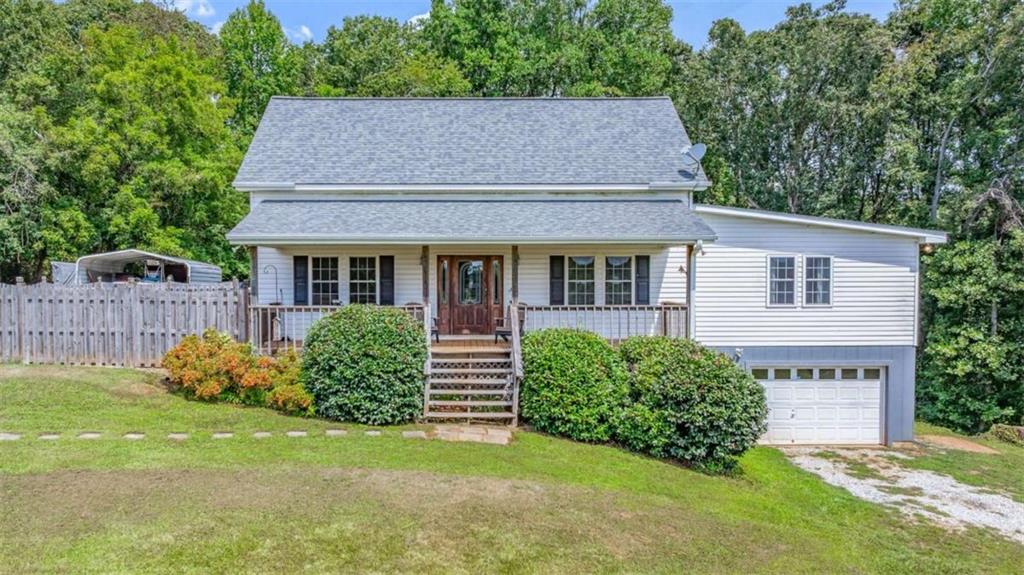 131 Caudell Drive Lula, GA 30554 - Photo 44 of 45 a aerial view of a house with a yard and plants