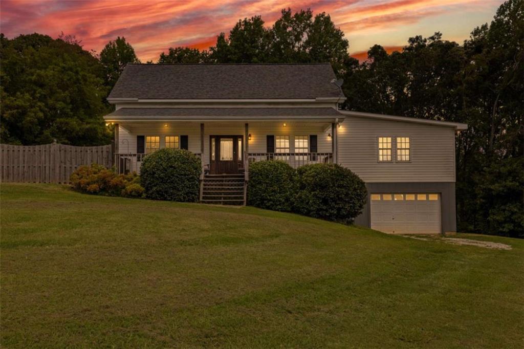 131 Caudell Drive Lula, GA 30554 - Photo 45 of 45 a front view of a house with garden