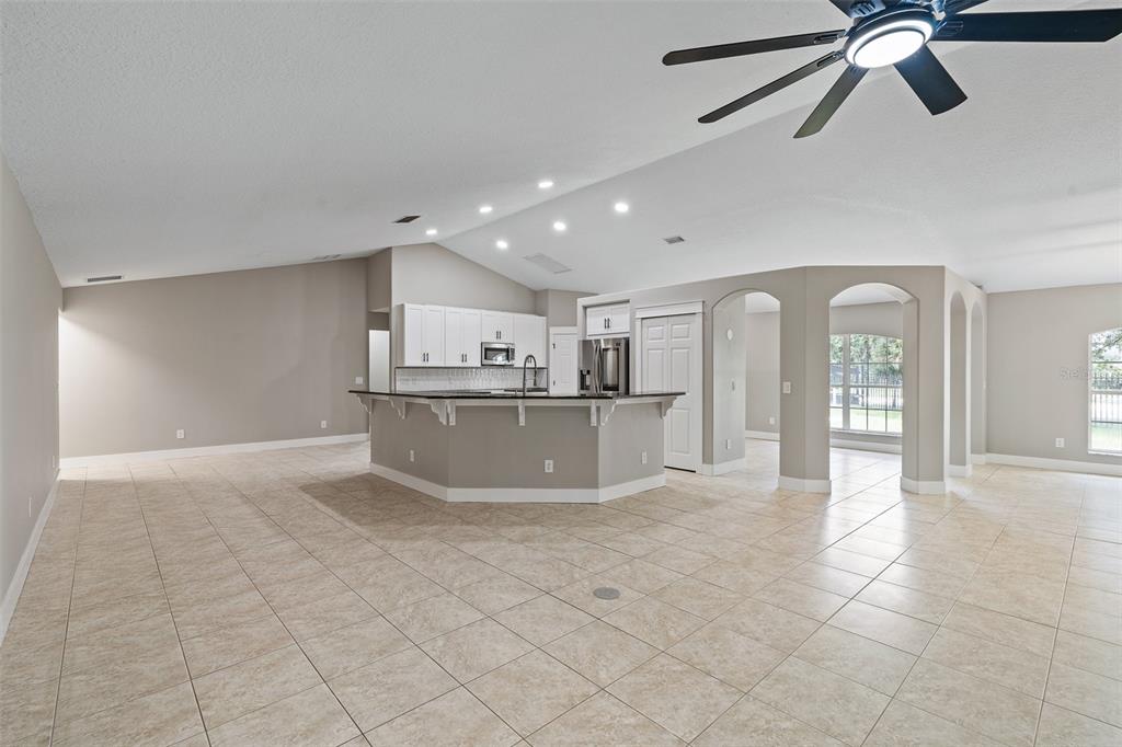 4191 Canal Avenue Bunnell, FL 32110 - Photo 12 of 81 a view of a kitchen with a sink and cabinets