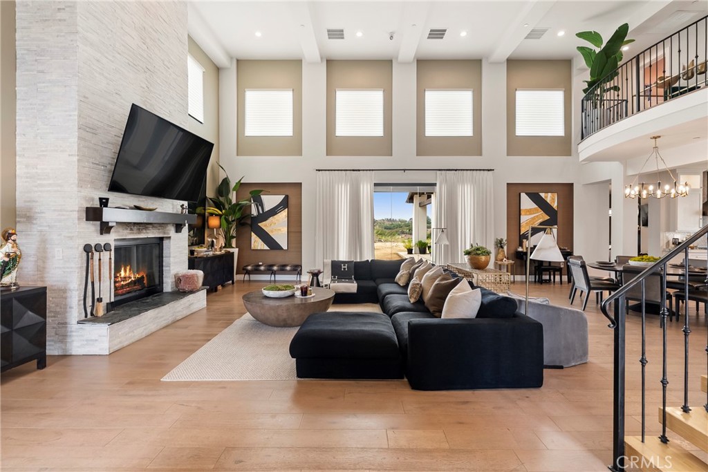 27716 Sycamore Mesa Road Temecula, CA 92590 - Photo 12 of 73 a living room with furniture and a flat screen tv